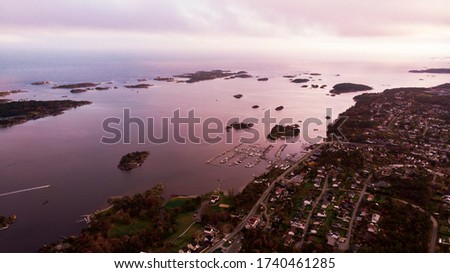Drone view over Grimstad and Kristiandsand coast. Aerial pictures.