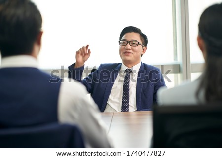 young asian business person talking big in front of hr interviewers during job interview Royalty-Free Stock Photo #1740477827