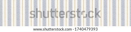 Seamless french farmhouse stripe border pattern. Provence blue linen shabby chic style. Hand drawn texture. Yellow blue banner background. Modern textile ribbon trim Royalty-Free Stock Photo #1740479393