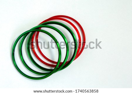 Top view side view of Green bangles and red bangles isolated in white background Royalty-Free Stock Photo #1740563858