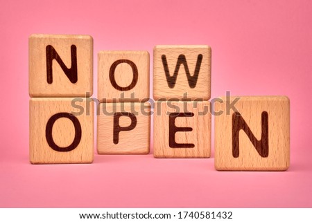now open message on pink background. Now open made with building blocks