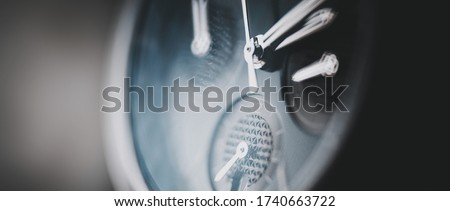 Elegant and Luxury Mens Wristwatch in Shallow Depth of Field. Macro Photo. Timepieces Industry. Chronometer Hand Watch. Royalty-Free Stock Photo #1740663722