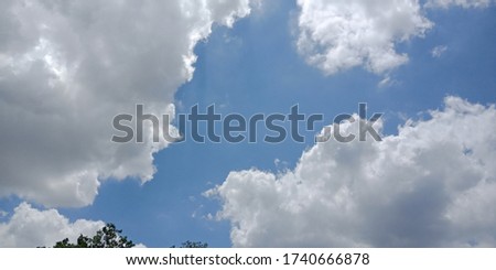 The picture of white clouds in the sky among the blue sky, small white clouds Many after the rain On a clear day