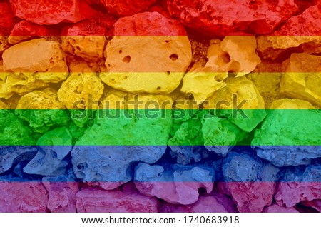 Wall of large stones. The texture of light sandstone. LGBT natural pattern, Vintage texture background, Abstract painting
