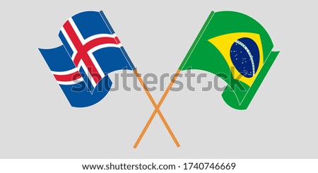 Crossed and waving flags of Iceland and Brazil