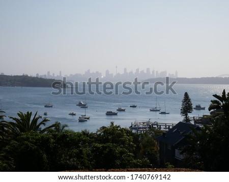Sydney skyline with boats at the foreground