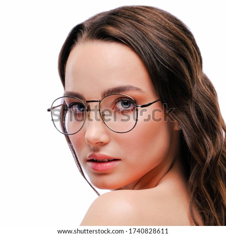  Beautiful woman natural face  in glasses shoulder portrait white background 