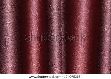 
Photo of a crimson curtain
