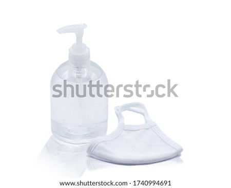 Alcohol gel and white mask isolated on white background for hand cleaning and protection COVID-19.