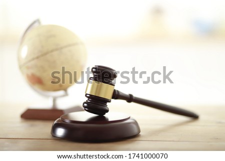 Gavel with globe. Law concept Royalty-Free Stock Photo #1741000070