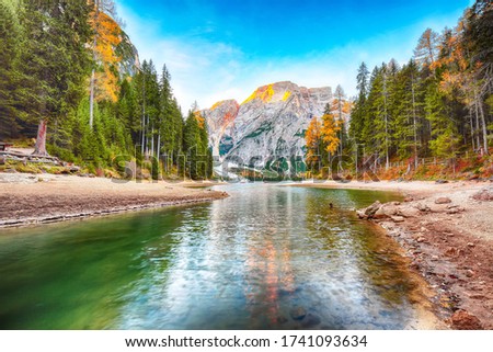 Amazing scenery of famous alpine lake Braies at autumn. Location:  national park Fanes-Sennes-Braies, region Trentino-Alto Adige , province Bolzano, Italy, Europe