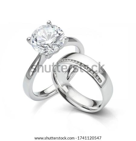 Large Diamond Ring with Diamond Wedding Ring Jewellery Set on White Background Royalty-Free Stock Photo #1741120547