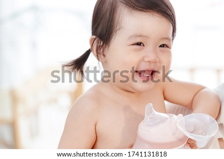 Lovely baby to drink milk