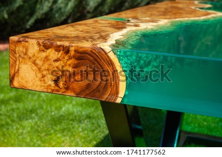 epoxy resin handmade wooden table Royalty-Free Stock Photo #1741177562
