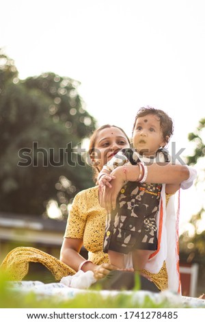 Happy loving family. Mother and her son playing, laughing, kissing and hugging.