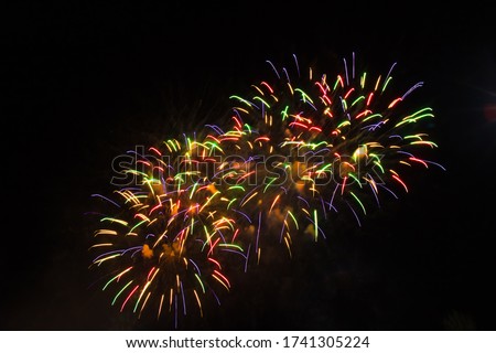 Beautiful colorful firework isolated on black background.  