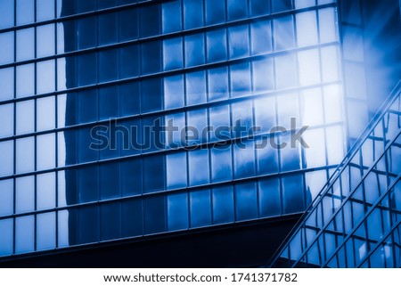 Glass facade in abstract city building