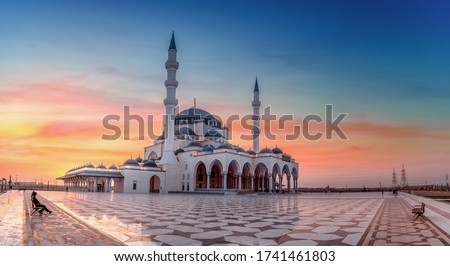 Beautiful Mosque in the world Sharjah New Mosque Amazing Architecture Design great view during sunset Dubai Travel and Tourism image famous tourism spot  Royalty-Free Stock Photo #1741461803