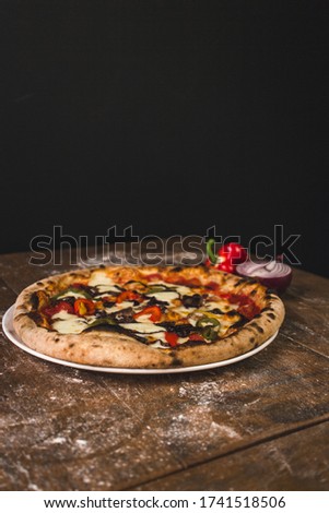 Onion and Pepper Cheese Pizza with mulitple shots