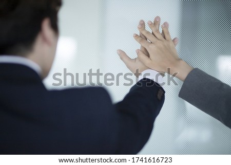 Business people gathering hands in office