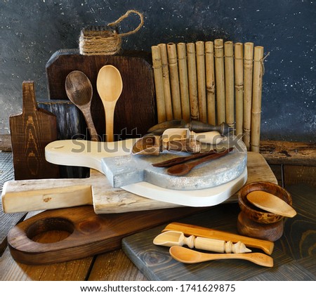 Wooden products, props for food photography. Chopping boards of different sizes, textures and colors, scoops for spices and sugar, spoons, forks, saucers, bamboo Mat. Do it yourself..