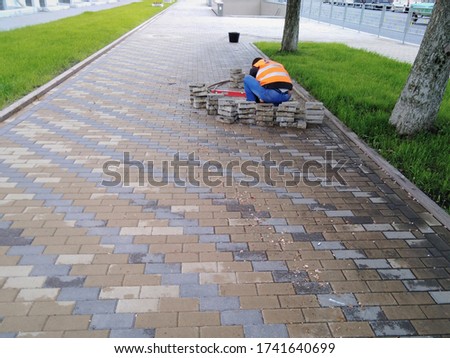 repair and replacement of paving slabs