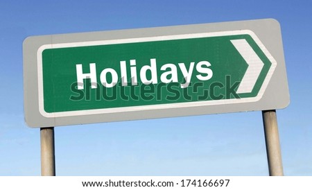 Holiday planning. Holiday ahead - street sign with arrow pointing to the right, against a clear blue sky in the background. 