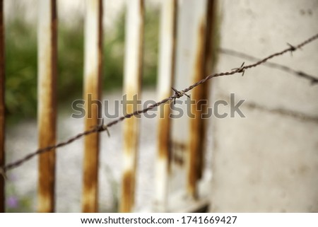 Rusty barbed wire, protection and safety, danger