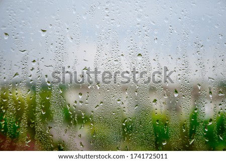 background of water drops on the window, Water drops on wet window glass after the rain in summer
