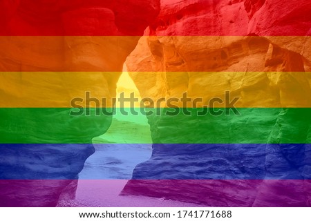 sunlight makes its way through the rocks of the great red canyon in Eilat in Israel. LGBT natural pattern, Vintage texture background, Abstract 
