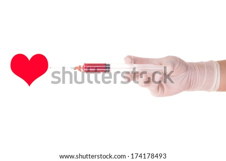 Medical syringe and heart concept
