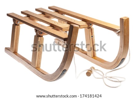Color picture of a wooden sledge isolated on white
