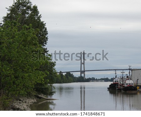 tug boats tied up on the Fraser river