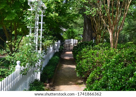Sidewalk through the village of Pinehurst in North Carolina Royalty-Free Stock Photo #1741866362