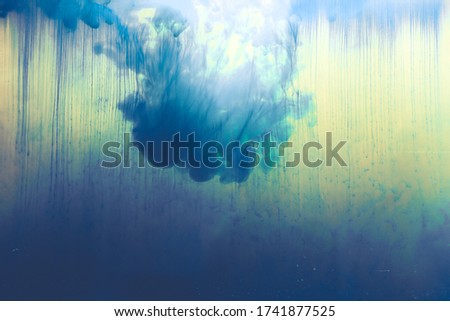 blue smoke color Motion drop in water swirling Colorful ink abstraction.Fancy Dream Cloud of ink background
