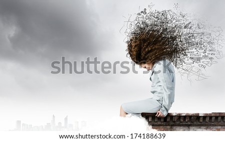 Young attractive blond girl against sketch background