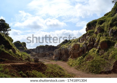 stone hill landscape with a beautiful blue sky background