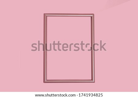 Empty mother-of-pearl pink frame in the center on a pastel background with copy space.