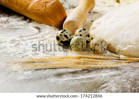 White bread drought and flour on kitchen table