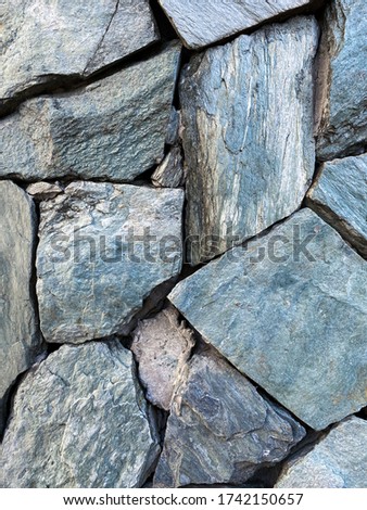 Rough gray stones pattern background.