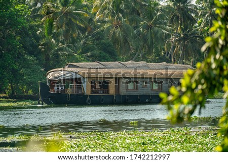 House Boat Moving in the Backwaters of Kerala