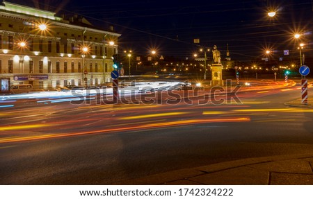 
Сar lights tracks in the night city