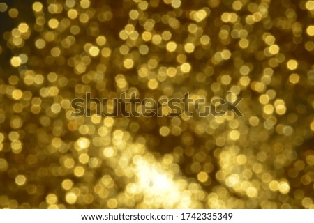 Beautiful golden sparkling bokeh image