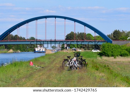 With the bicycle on a canal near eberswalde iin germany