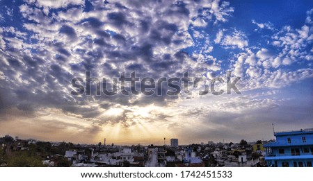 blue cloudy sky with pattern forming clouds