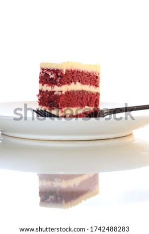 A slice of red velvet cake. Isolated picture of red velvet cake. Delicious scrumptious cake.
