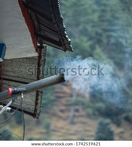 Smoke coming out from chimney in Barot Valley