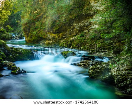 View on the beautiful Vintgar Gorge waterfall in Slovenia on an autumn day.