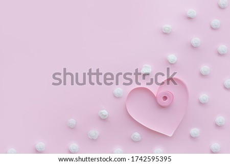 Pink wedding background decorated ribbon and white flowers. Concept wedding flat lay.