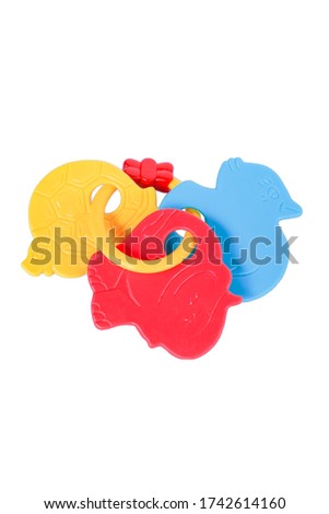 Plastic Kid toys figure of a blue duck, red elephant, yellow turtle isolated on white background 